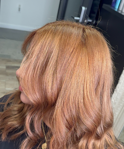 A close up of a woman with red hair